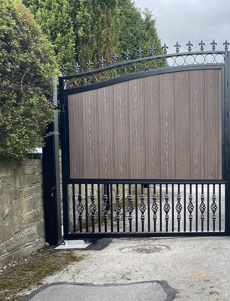 Composite clad electric gates